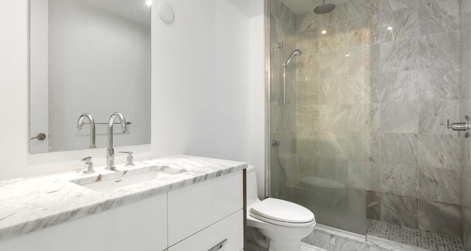 a bathroom with a glass shower